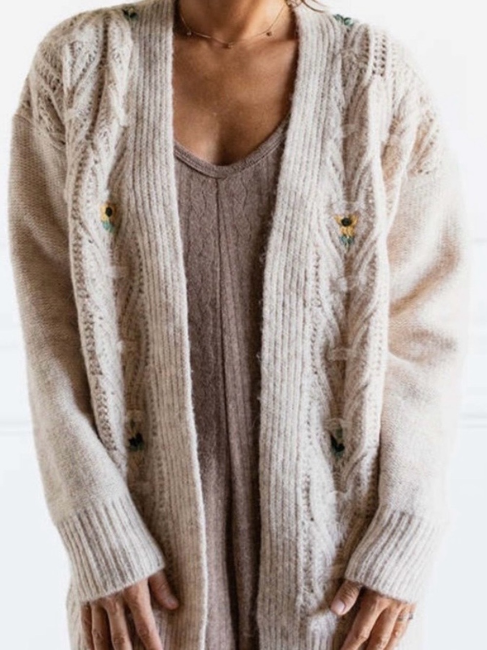 Lush Cream Open-Front Cable Knit Cardigan with Subtle Floral Embroidery